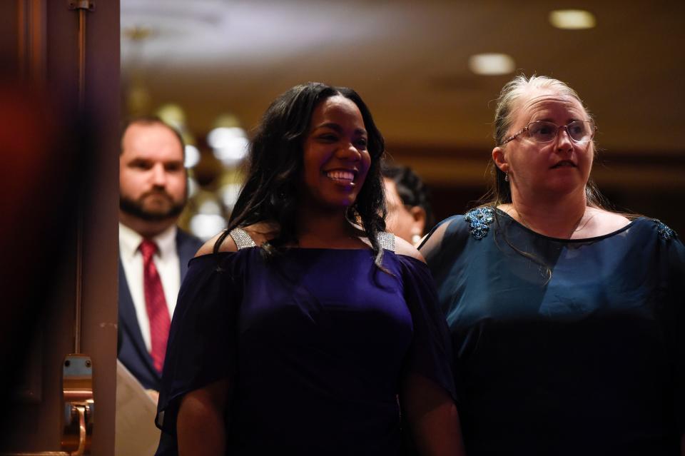 Winner of Teacher of the Year Shikara Willis walks the red carpet during Richmond County's Teacher of the Year awards at the Augusta Marriott on Thursday, Oct. 6, 2022. Willis is a fifth grade teacher at C.T. Walker Magnet School.