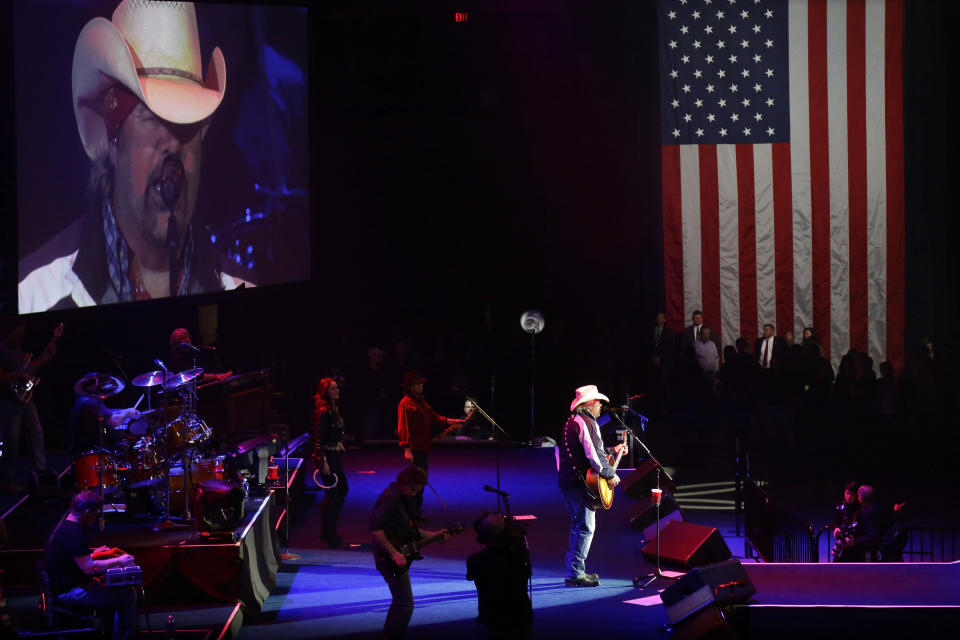FILE - Toby Keith performs during the inaugural concert for Republican Gov. Bruce Rauner on Monday, Jan. 12, 2015, in Springfield, Ill. Keith, who died of cancer on Monday, Feb. 5, 2024, at age 62, is being celebrated for his immense catalog of songs. But his 2002 track “Courtesy Of The Red, White And Blue (The Angry American)" may be remembered most. (AP Photo/Seth Perlman, File)