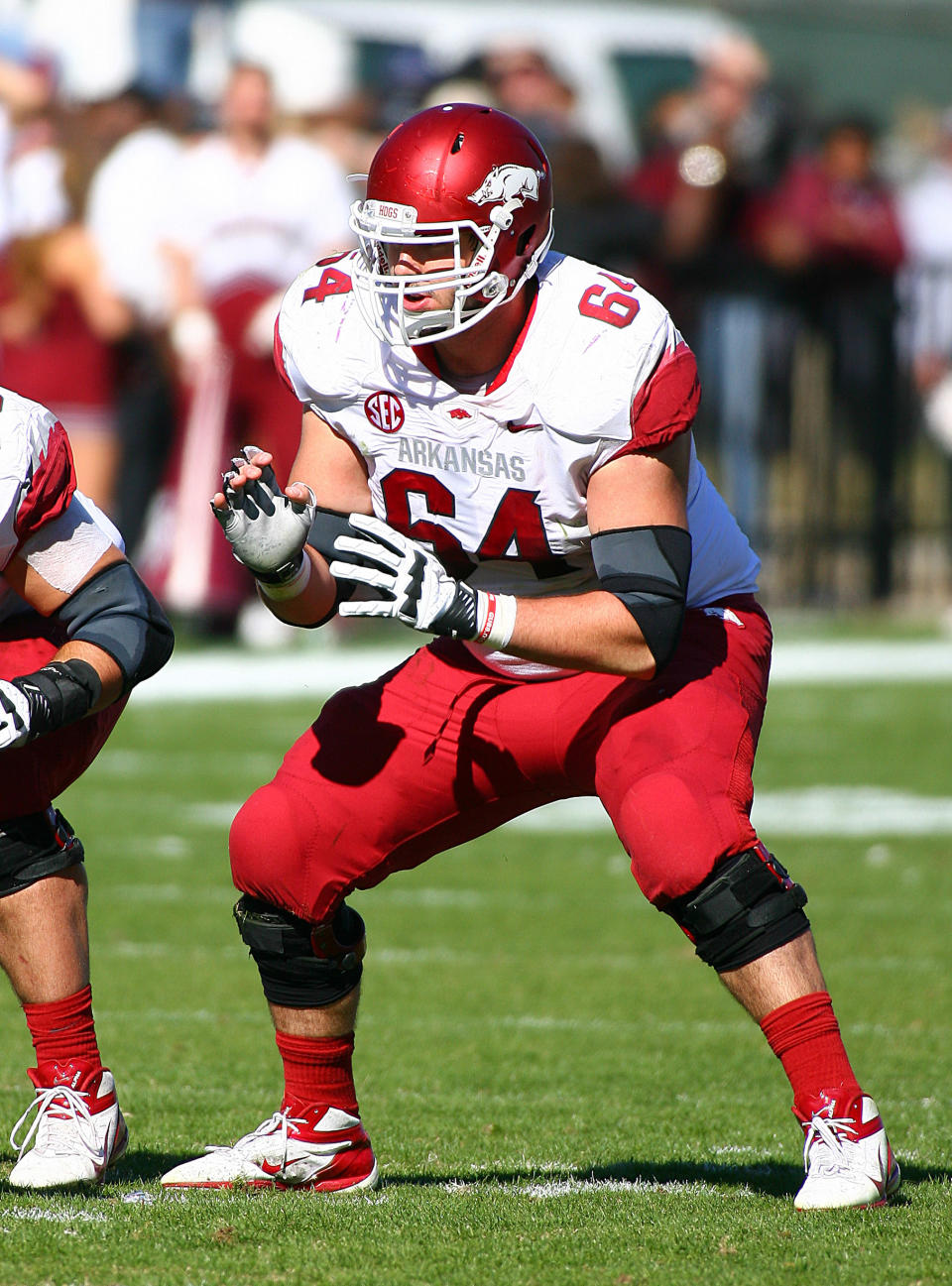 Nov 17, 2012; Starkville, MS, USA; Arkansas Razorbacks center Travis Swanson (64) during the game against the <a class="link " href="https://sports.yahoo.com/ncaaf/teams/mississippi-st/" data-i13n="sec:content-canvas;subsec:anchor_text;elm:context_link" data-ylk="slk:Mississippi State Bulldogs;sec:content-canvas;subsec:anchor_text;elm:context_link;itc:0">Mississippi State Bulldogs</a> at Davis Wade Stadium. Mississippi State Bulldogs defeated the Arkansas Razorbacks 45-14. Mandatory Credit: Spruce Derden–USA TODAY Sports