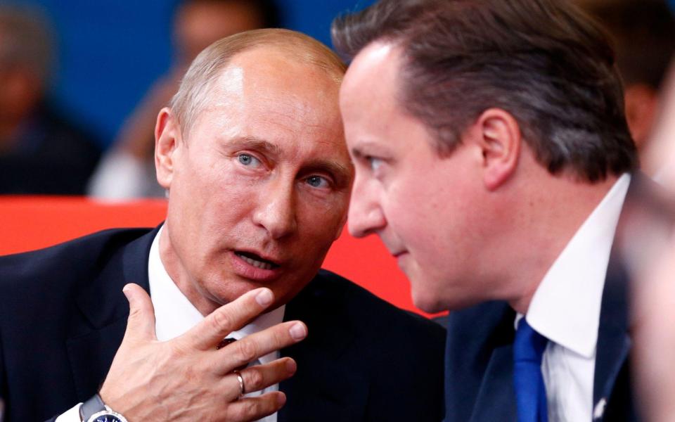 Vladimir Putin talks with David Cameron at the London 2012 Olympic Games - BBC/Darren Staples