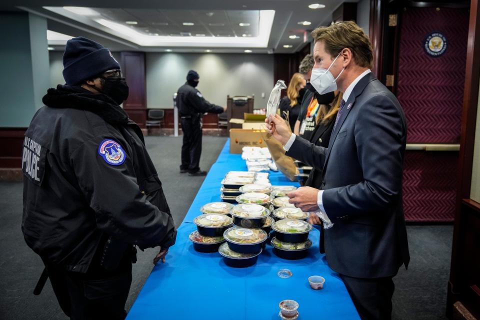Rep. Dean Phillips (D-MN) serves free lunches to police and staff members at the U.S. Capitol on Jan. 6, 2022, in Washington, D.C. One year prior, supporters of President Donald Trump attacked the U.S. Capitol Building to disrupt a congressional vote to confirm the electoral college win for Joe Biden.