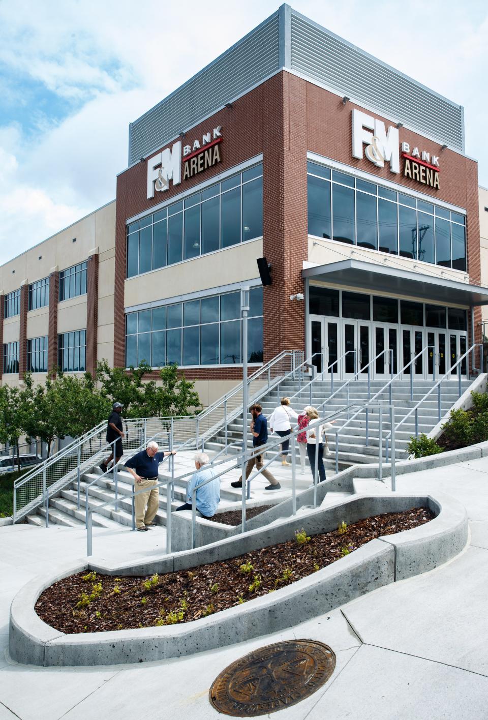 People arrive outside F&M Bank Arena before the arenas grand opening in Clarksville, Tenn. on Saturday, July 15, 2023.