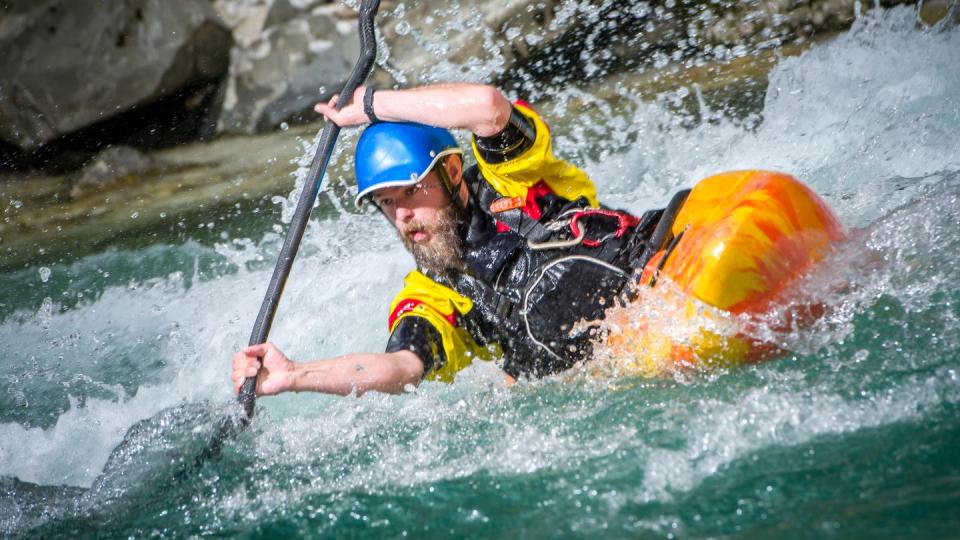 kayaker on river soča