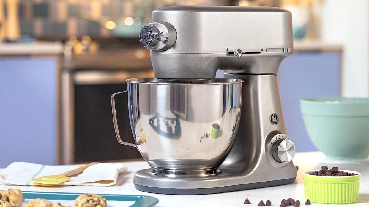  GE Stand Mixer on a countertop with cookies in front of it. 