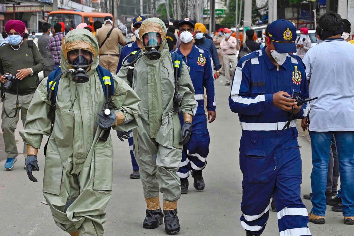 National Disaster Response Force (NDRF) personnel arrive to inspect the gas leak accident at a factory in Ludhiana, India (AFP via Getty Images)