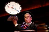 Master of Ceremonies Marc Abrahams holds up a 2016 Ig Nobel Prize while presiding over the 26th First Annual Ig Nobel Prize ceremony at Harvard University in Cambridge, Massachusetts, U.S. September 22, 2016. REUTERS/Brian Snyder