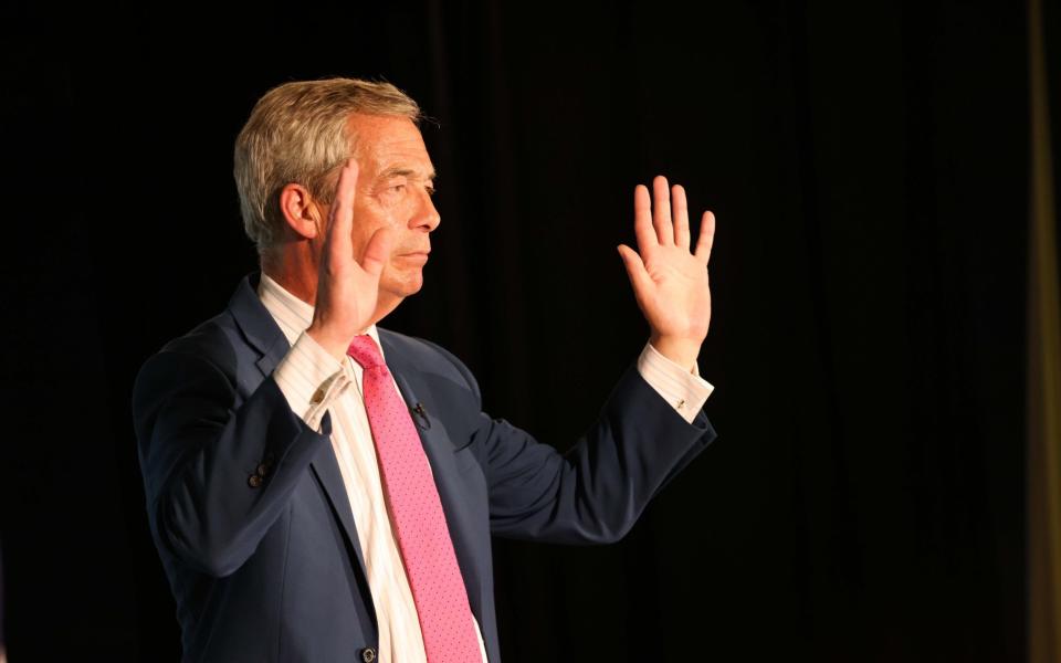 Reform UK leader Nigel Farage speaking at a meeting in Boston, while on the General Election campaign trail