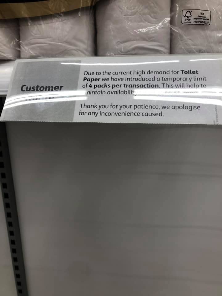 A notice inside a Coles store informing customers of its new four pack limit. Source: Facebook