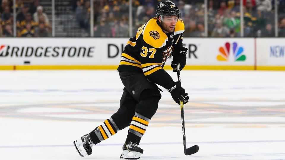 <p>Patrice Bergeron #37 of the Boston Bruins skates with the puck against the Toronto Maple Leafs in Game Two of the Eastern Conference First Round during the 2019 NHL Stanley Cup Playoffs at TD Garden.</p>
