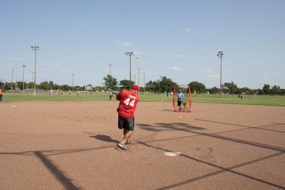 The Senior League Softball team practices at John Stiff Park.