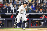 New York Yankees designated hitter Aaron Judge drops the bat after hitting a double against Boston Red Sox starting pitcher Brayan Bello during the first inning of a baseball game Sunday, Sept. 25, 2022, in New York. (AP Photo/Jessie Alcheh)