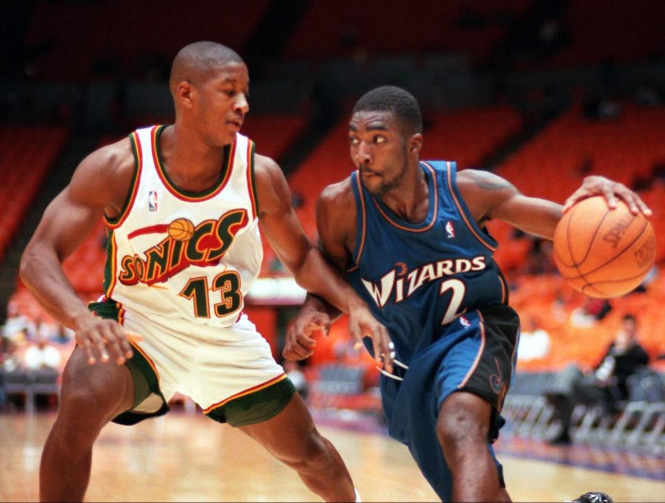 God Shammgod, right, the former Providence College player who went on to play in the NBA, including this game with the Washington Wizards in 1997, is included in a new documentary about point guards from New York City.