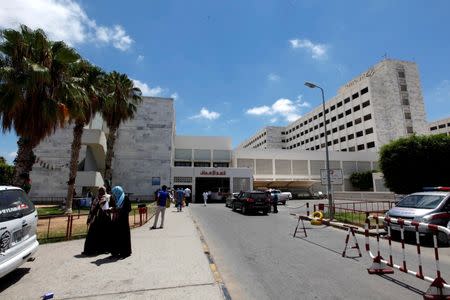 Libyans walk at Tripoli Medical Center in Tripoli, Libya, July 20, 2016. Picture taken July 20, 2016. REUTERS/Ismail Zitouny
