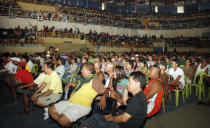 People watch the live telecast of the WBO welterweight title bout between Philippine boxing icon Manny Pacquiao and Timothy Bradley of the US at a stadium in General Santos City, in southern island of Mindanao on June 10, 2012. The Philippines was silenced June 10 after boxing superstar Manny Pacquiao was stunned by American challenger Timothy Bradley, losing his first bout in seven years. AFP PHOTO/Paul BernaldezPAUL BERNANDEZ/AFP/GettyImages