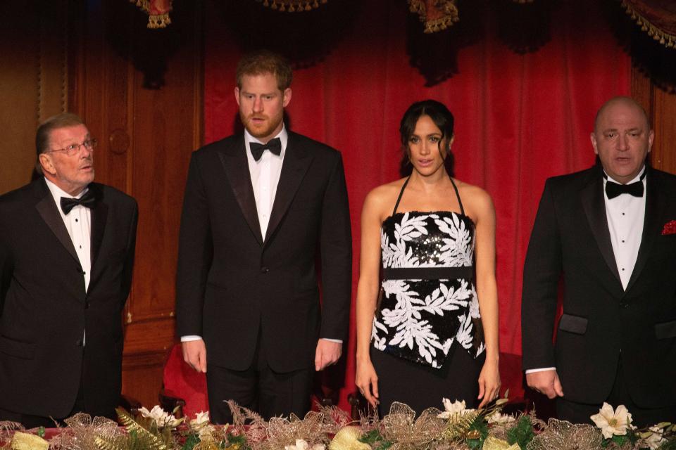 The couple stood tall and proud on the royal balcony at the Royal Variety Performance, to belt out the national anthem, God Save the Queen. Photo: Getty Images