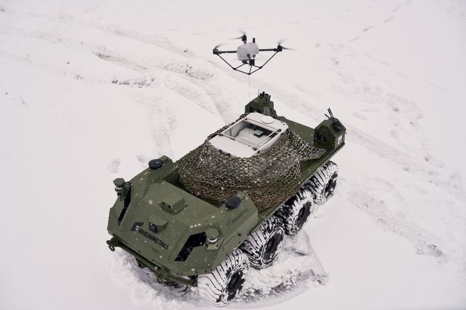 mission master sp unmanned ground vehicle with elistair khronos tethered drone deployed