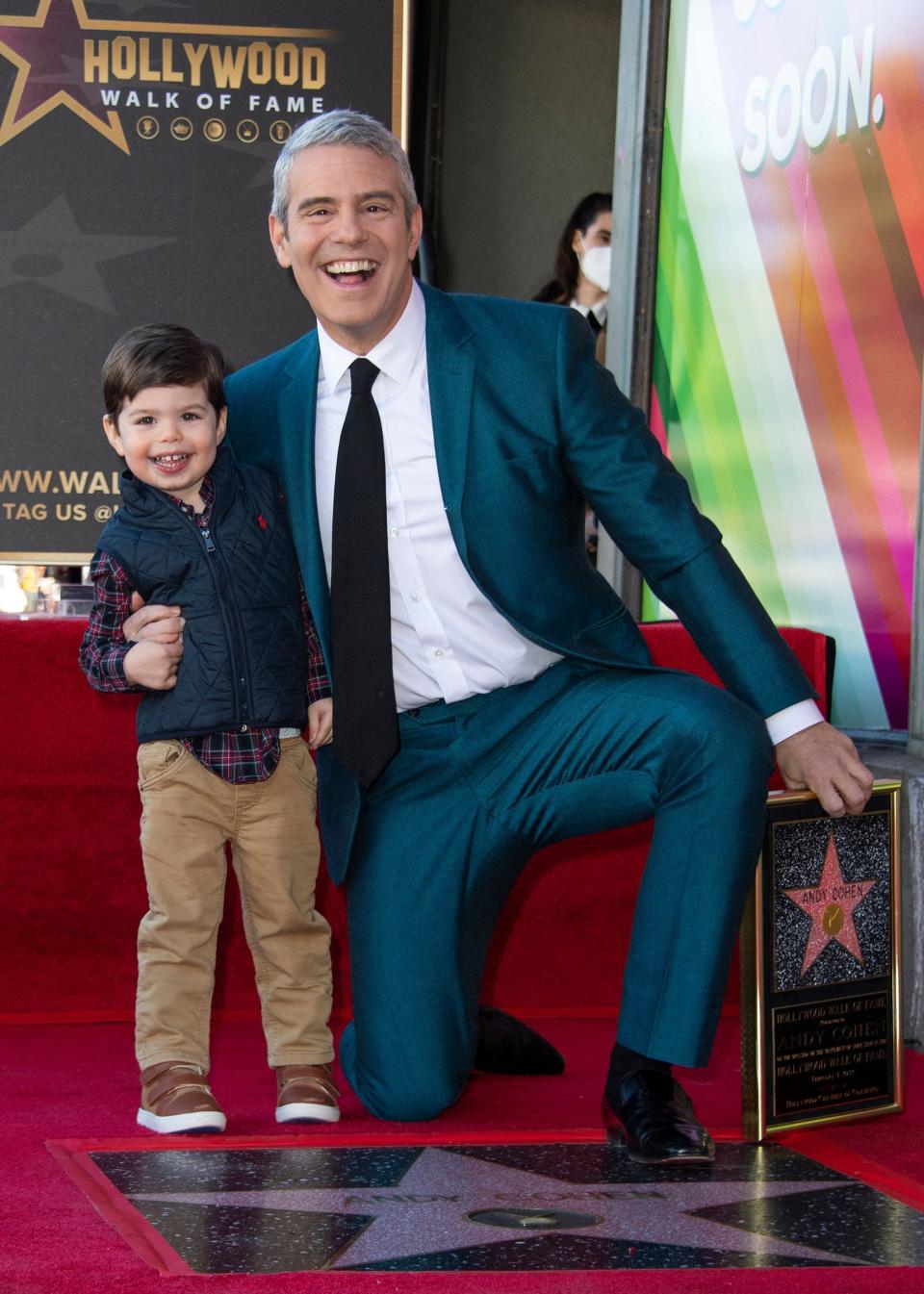 Andy Cohen, right, poses with his son Benjamin during a ceremony to honor Cohen with a Hollywood Walk of Fame star in Los Angeles, California, on Feb. 4, 2022.