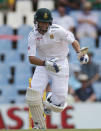 South Africa's Stephen Cook makes a run during the fourth cricket test match against England at Centurion, South Africa, January 22, 2016.REUTERS/Siphiwe Sibeko