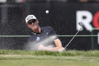 Seamus Power hits onto the 11th green during the third round of the Rocket Mortgage Classic golf tournament Saturday, July 4, 2020, at Detroit Golf Club in Detroit. (AP Photo/Carlos Osorio)