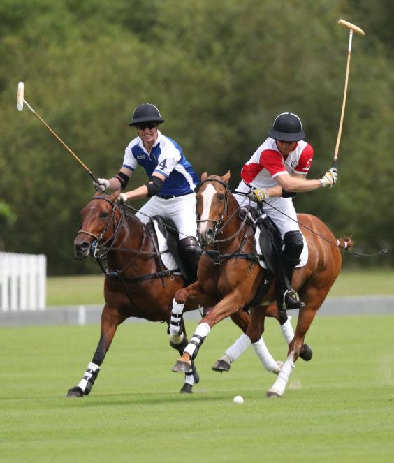 Dukes of Cambridge and Sussex participate in charity polo match together in Berkshire (Andrew Matthews/PA Wire)