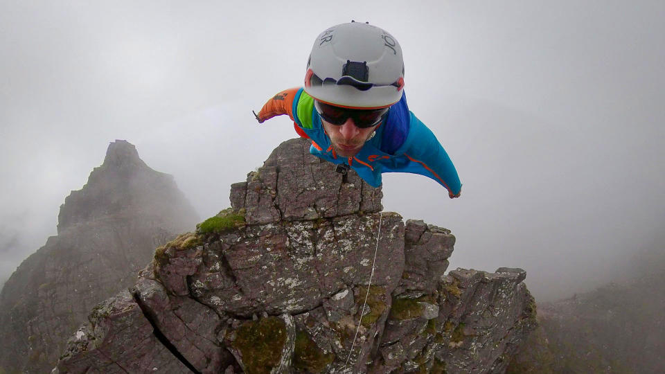 A brave base jumper has become the first person ever to fly a wingsuit from the top of a British mountain. Former Royal Marine Tim Howell, 31, leapt from the 4,000ft peak of An Teallach in the northwest Highlands in Scotland. He plunged down a steep gully for 30 seconds before deploying his parachute and landing safely on the banks of Loch Toll an Lochain.