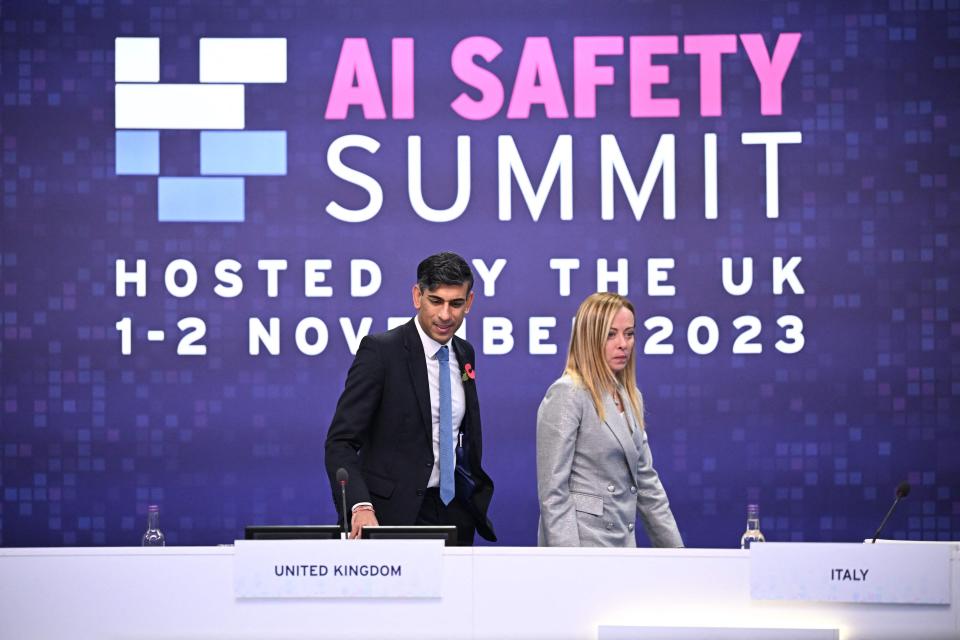 Britain's Prime Minister Rishi Sunak, left, and Italy's Prime Minister Giorgia Meloni attend the U.K. Artificial Intelligence (AI) Safety Summit at Bletchley Park, in central England, on Nov. 2, 2023.