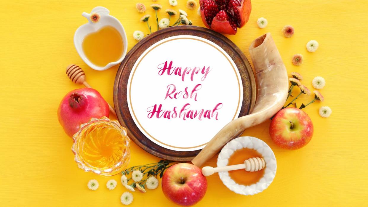 happy rosh hashanah jewish new year holiday concept with traditional symbols