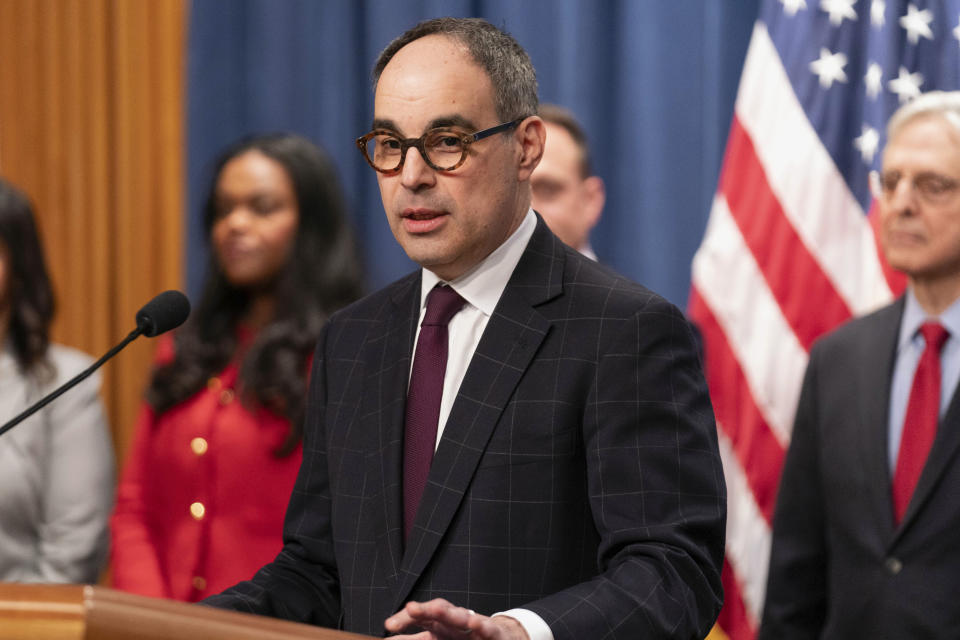 Assistant Attorney General Jonathan Kanter, of the Antitrust Division, speaks during a news conference at Department of Justice headquarters in Washington, Thursday, March 21, 2024. The Justice Department on Thursday announced a sweeping antitrust lawsuit against Apple, accusing the tech giant of engineering an illegal monopoly in smartphones that boxes out competitors and stifles innovation. (AP Photo/Jose Luis Magana)