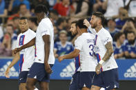 PSG's Lionel Messi, centre, celebrates after scoring his side's opening goal during the French League One soccer match between Strasbourg and Paris Saint Germain at Stade de la Meinau stadium in Strasbourg, eastern France, Saturday, May 27, 2023. (AP Photo/Jean-Francois Badias)