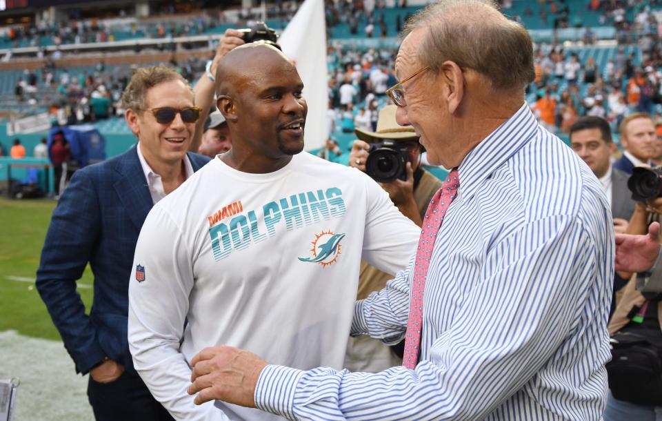 Miami Dolphins head coach Brian Flores is congratulated by Miami Dolphins owner Stephen Ross after the victory over the Philadelphia Eagles. Hard Rock Stadium, Miami Gardens, Florida.