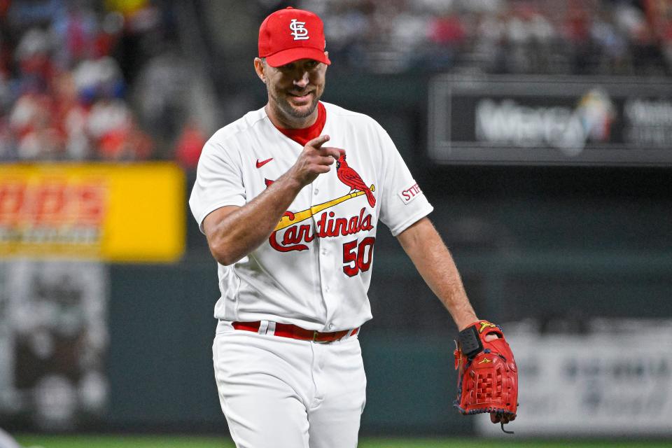 St. Louis Cardinals starting pitcher Adam Wainwright (50) celebrates after his team completes a double play against the Milwaukee Brewers to end the sixth inning.