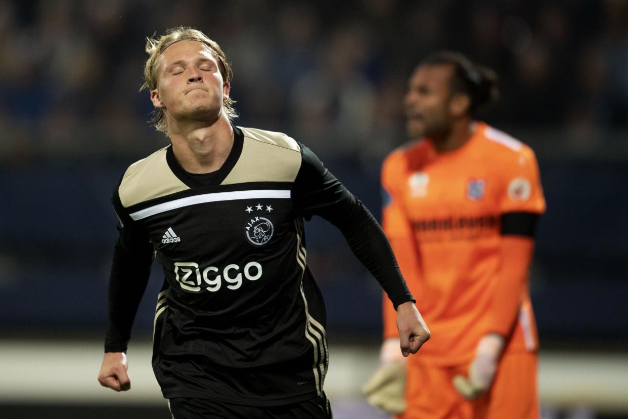 Dolberg out to celebrate his new contract against Benfica: AFP/Getty Images