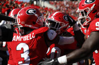Georgia defensive back J.R. Reed (20) celebrates with teammates after scoring a touchdown in the first half of an NCAA college football game against Murray State, Saturday, Sept. 7, 2019, in Athens, Ga. (Joshua L. Jones/Athens Banner-Herald via AP)