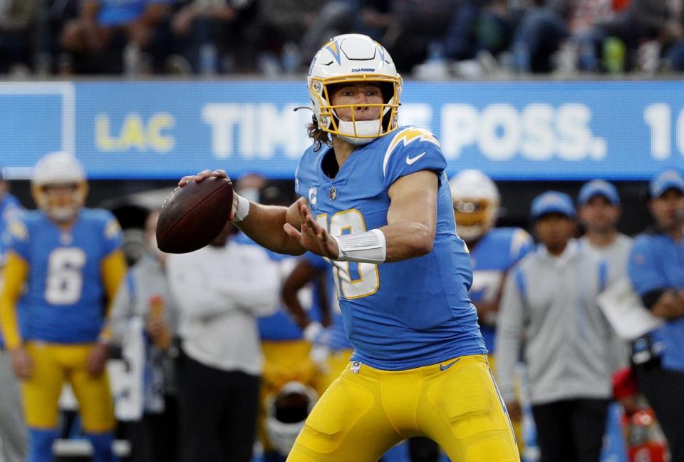 Chargers quarterback Justin Herbert looks to pass.