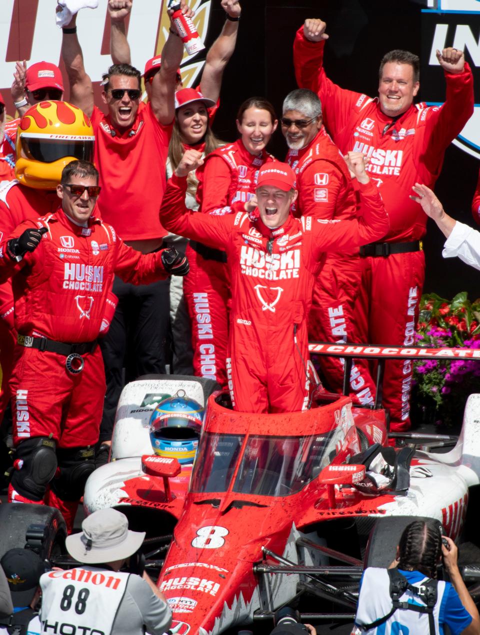 Chip Ganassi Racing driver Marcus Ericsson (8) celebrates on the podium Sunday, May 29, 2022, after winning the 106th running of the Indianapolis 500 at Indianapolis Motor Speedway