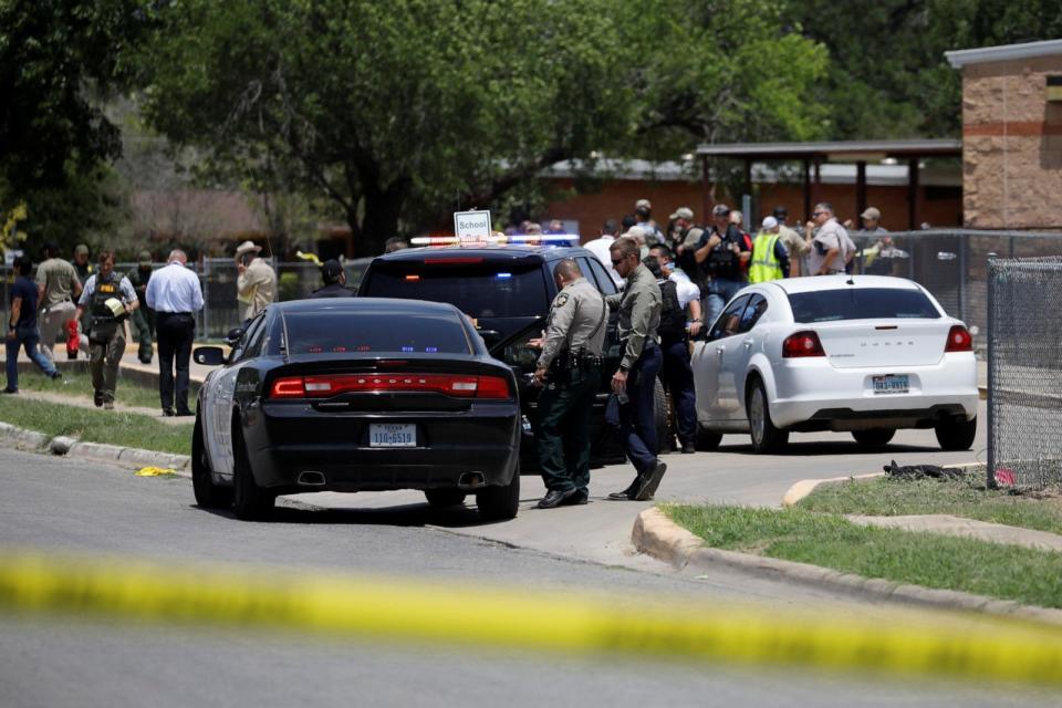 PHOTO: Law enforcement officers guard the scene of a shooting at Robb Elementary School in Uvalde, Texas, May 24, 2022.   (Marco Bello/Reuters)