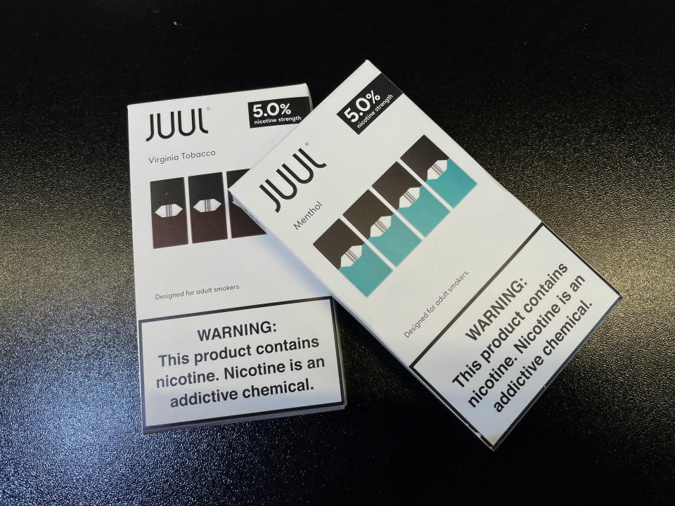 Juul e-cigarettes are seen on the counter of a vape store in Santa Monica, California, U.S., June 23, 2022. REUTERS/Lucy Nicholson