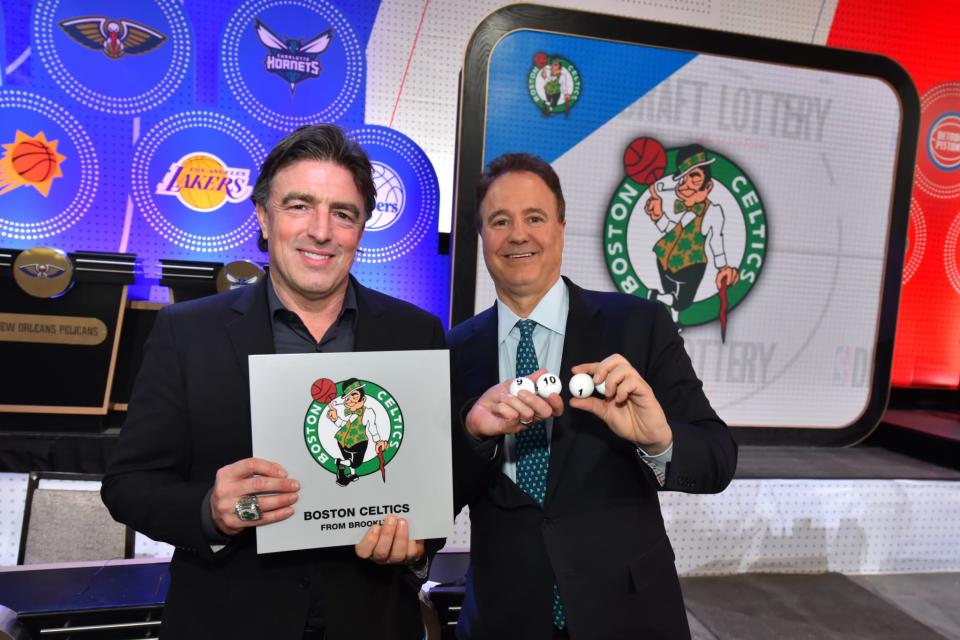 Celtics part-owners Wyc Grousbeck and Stephen Pagliuca pose for a photo after getting the No. 11 pick during the 2017 NBA Draft Lottery. (Jesse D. Garrabrant/NBAE/ Images)