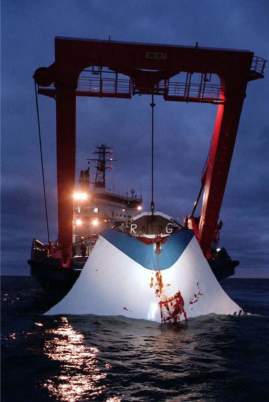 FILE PHOTO: Bow door of sunken Estonia ferry is lifted from sea bed