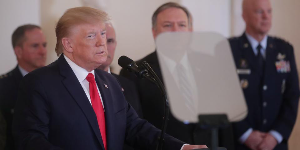 U.S. President Donald Trump is accompanied by Vice President Mike Pence, Secretary of State Mike Pompeo and military leaders as he delivers a statement after Iran launched missile attacks on U.S.-led forces in Iraq, in the Grand Foyer at the White House in Washington, U.S., January 8, 2020. REUTERS/Jonathan Ernst