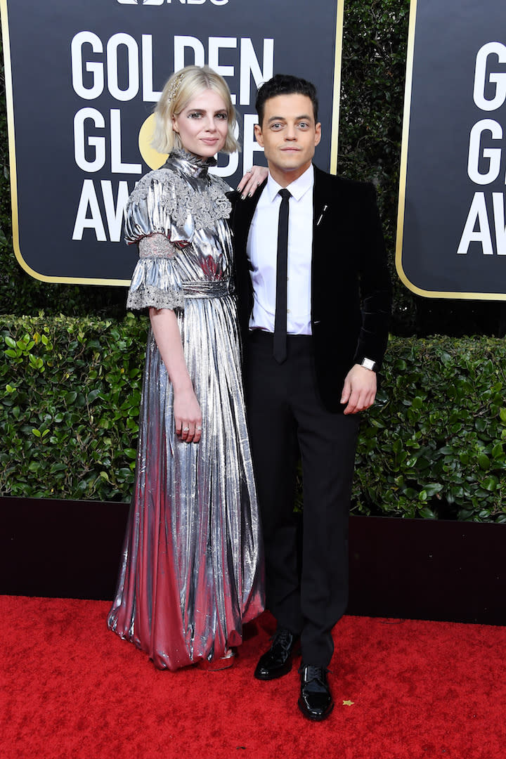 Lucy Boynton is wearing Louis Vuitton finished with Harry Winston Jewels while Rami Malek is in Saint Laurent. <em>[Photo: Getty]</em>