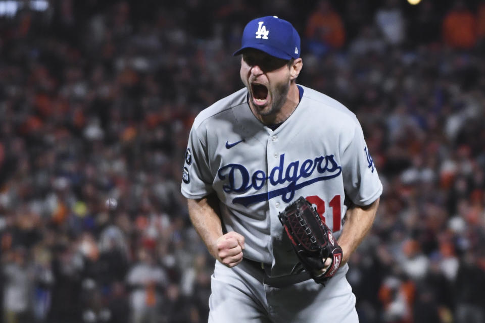 San Francisco, CA - October 14: Los Angeles Dodgers starting pitcher Max Scherzer reacts after striking out San Francisco Giants' Wilmer Flores to end game five of the 2021 National League Division Series at Oracle Park on Thursday, Oct. 14, 2021 in San Francisco, CA. The Dodgers won 2-1. (Wally Skalij / Los Angeles Times via Getty Images)