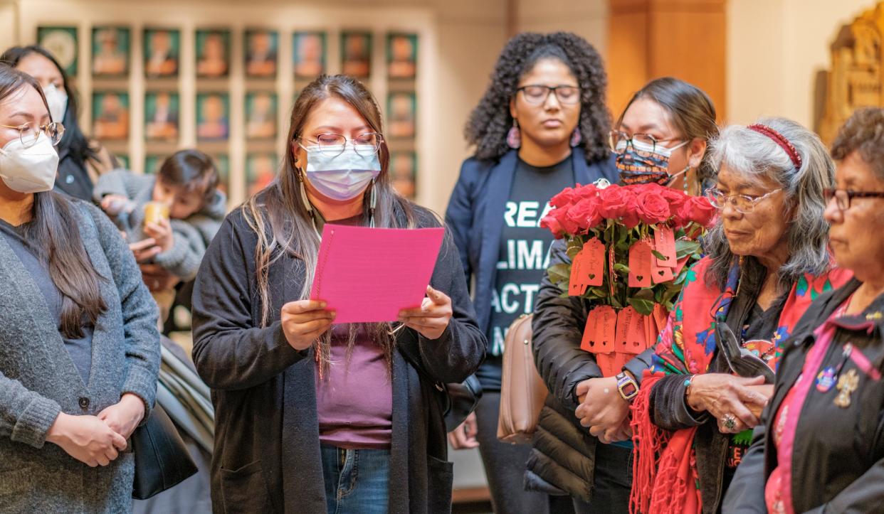 A group of demonstrators deliver roses from 68 neighborhoods believed at risk of nuclear waste transportation, Feb. 14, 2024 at the New Mexico Capitol in Santa Fe.