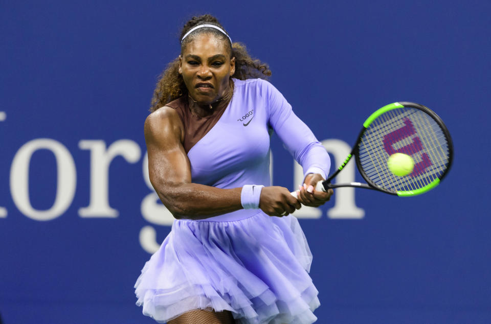 Serena Williams muscles up on a shot in her straight-set victory Wednesday. (Photo: TPN via Getty Images)