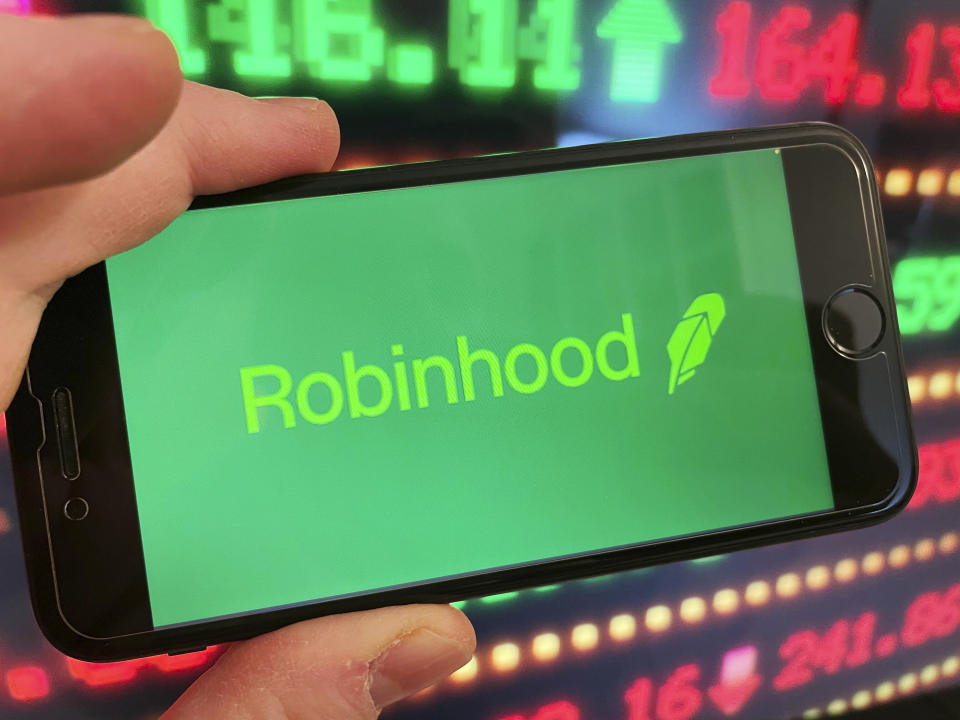 Photo by: STRF/STAR MAX/IPx 2021 1/29/21 Dow drops more than 600 points today to finish the worst week since October 2020 amidst the trading frenzy with GameStop, AMC and other stocks. Robinhood has come under intense scrutiny as it is now limiting trades on more than 50 stocks. Trading platforms such as STASH have issued statements favoring long term over short term trading. Platforms have struggled to keep up with the volume of trades being executed. STAR MAX Photo: An Robinhood logo and stock ticker symbols photographed off Apple devices.