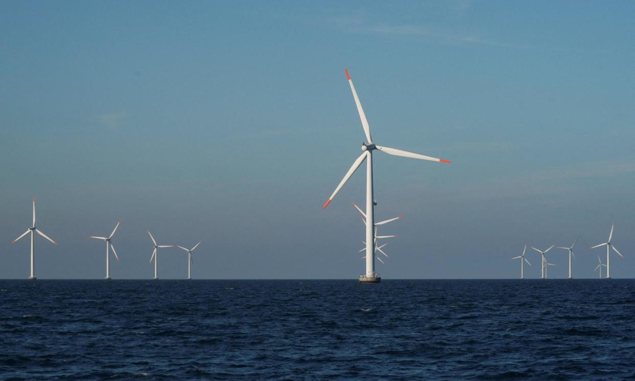 <span>Turbines at an offshore windfarm near Nysted, Denmark.</span><span>Photograph: Tom Little/Reuters</span>