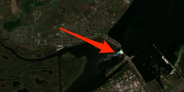 A satellite image, marked up by Insider with a red arrow, shows the Kakhovka dam and the surrounding region in Kherson Oblast, Ukraine, October 18, 2022.