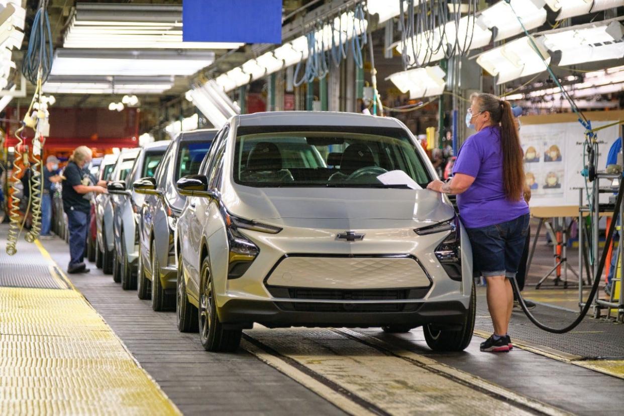 UAW Local 5960 member Kimberly Fuhr inspects a Chevrolet Bolt EV during vehicle production on Thursday, May 6, 2021, at the General Motors Orion Assembly Plant in Orion Township.