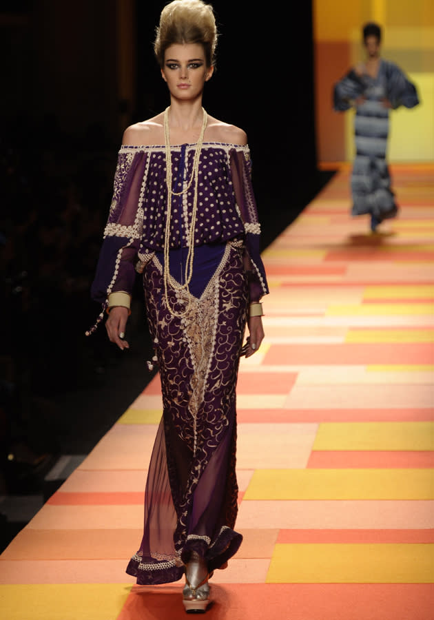 <b>Jean Paul Gaultier SS13 </b><br><br>Models sported strapless dresses in aubergine shades with polka dots.<br><br>© Rex