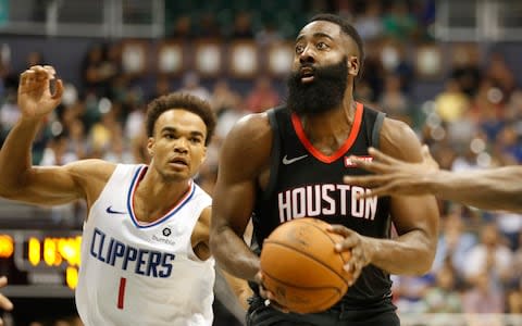 Houston Rockets shooting guard James Harden (13) gets by Los Angeles Clippers shooting guard Jerome Robinson - Credit: &nbsp;Marco Garcia